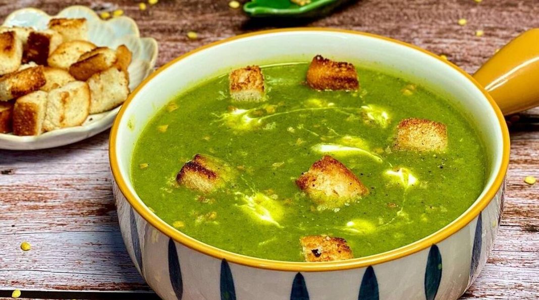 End your day with a comforting bowl of dal palak soup topped with garlic croutons (recipe inside)